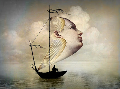barca con vela a forma di volto